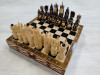 Шахматы резные Ледовая битва на резной доске фото 1 — hichess.ru - шахматы, нарды, настольные игры