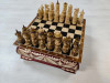 Шахматы резные ручной работы Богатыри в ларце 25 на 25 см фото 1 — hichess.ru - шахматы, нарды, настольные игры