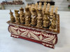 Шахматы резные ручной работы Богатыри в ларце 25 на 25 см фото 5 — hichess.ru - шахматы, нарды, настольные игры