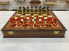 Шахматы эксклюзивные ручной работы Хохлома красное дерево фото 1 — hichess.ru - шахматы, нарды, настольные игры