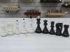 Шахматные фигуры профессиональные черно белые с утяжелением пластик фото 1 — hichess.ru - шахматы, нарды, настольные игры