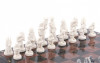 Шахматы "Средневековье" из лемезита и змеевика 40х40 см фото 3 — hichess.ru - шахматы, нарды, настольные игры
